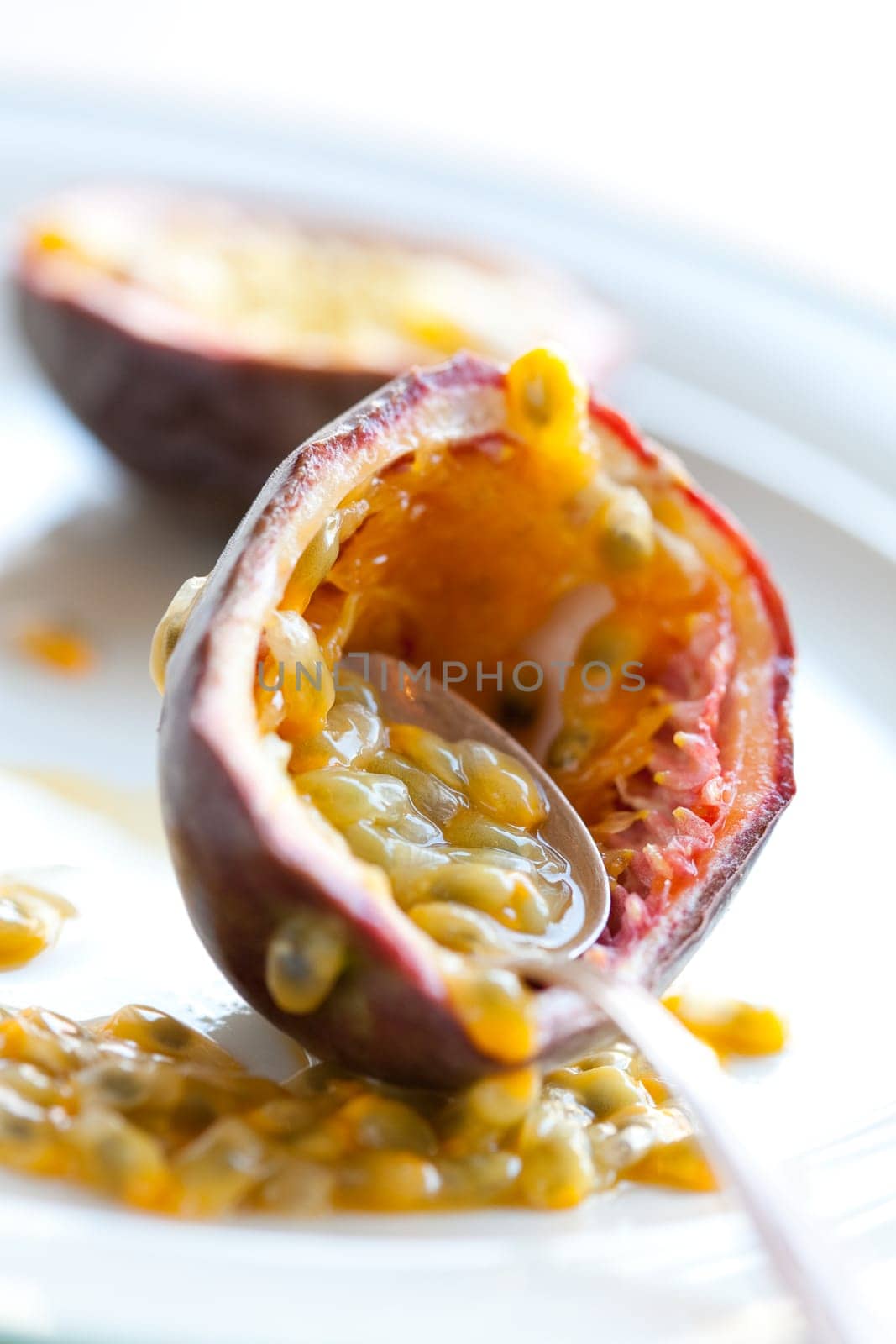 Delicious fresh passion fruit halves. Studio shot.