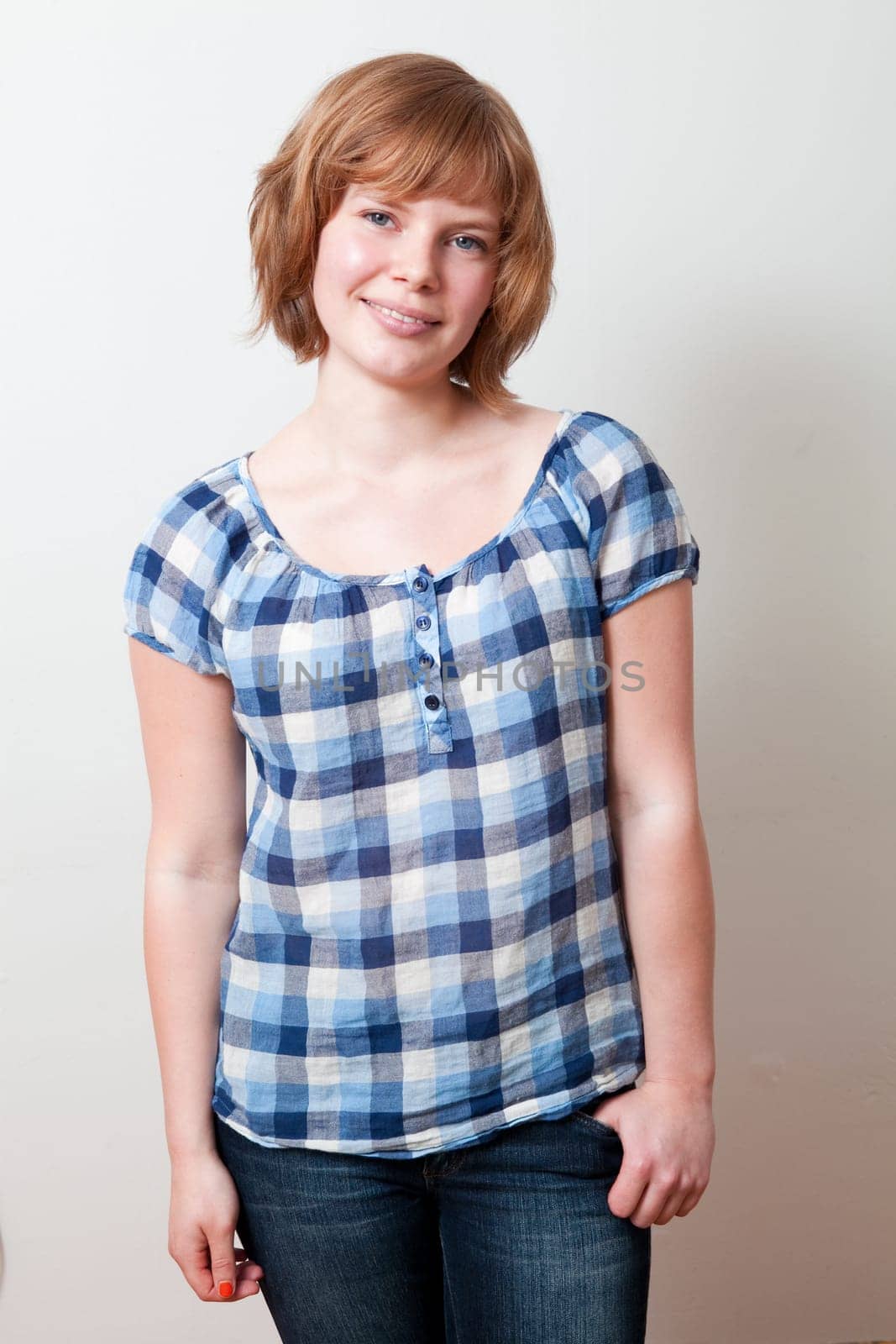 Portrait of a young beautiful woman. Studio shot.