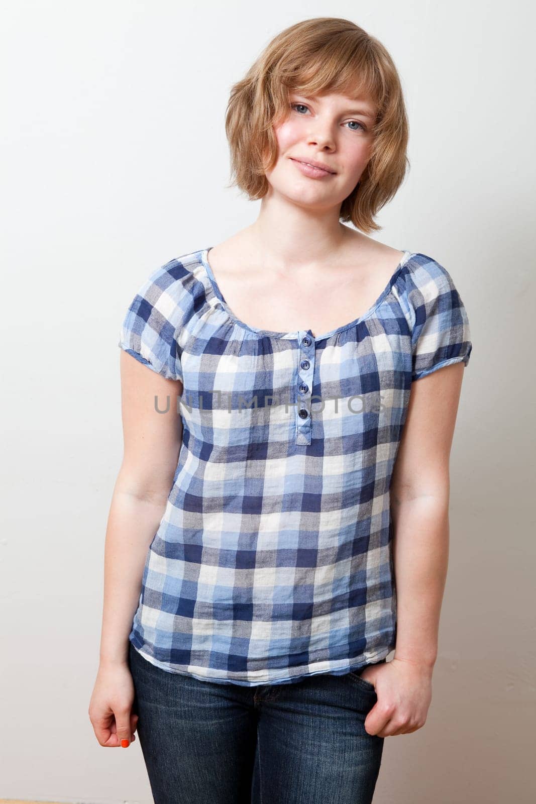 Portrait of a young beautiful woman. Studio shot.
