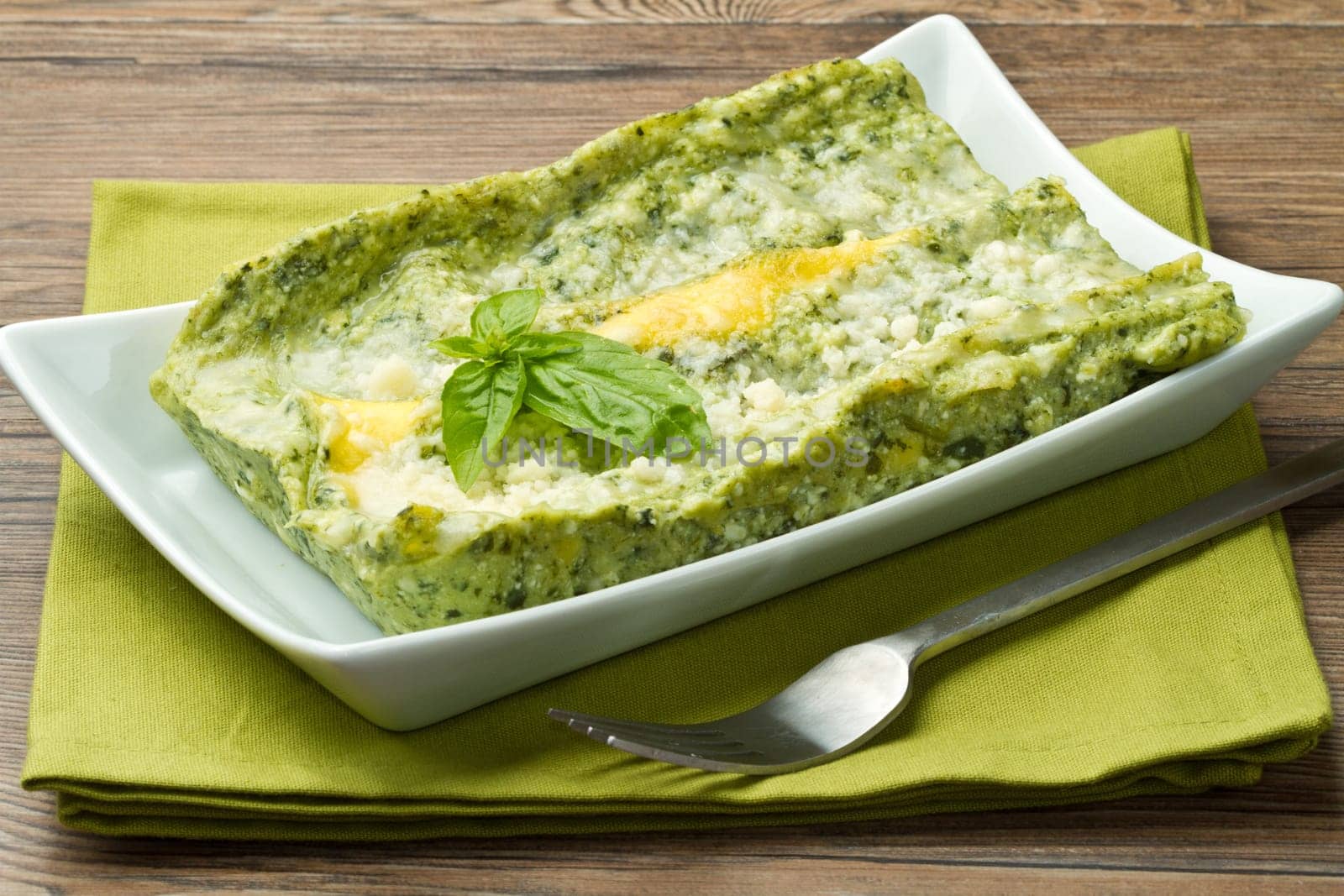 fresh lasagna with pesto sauce