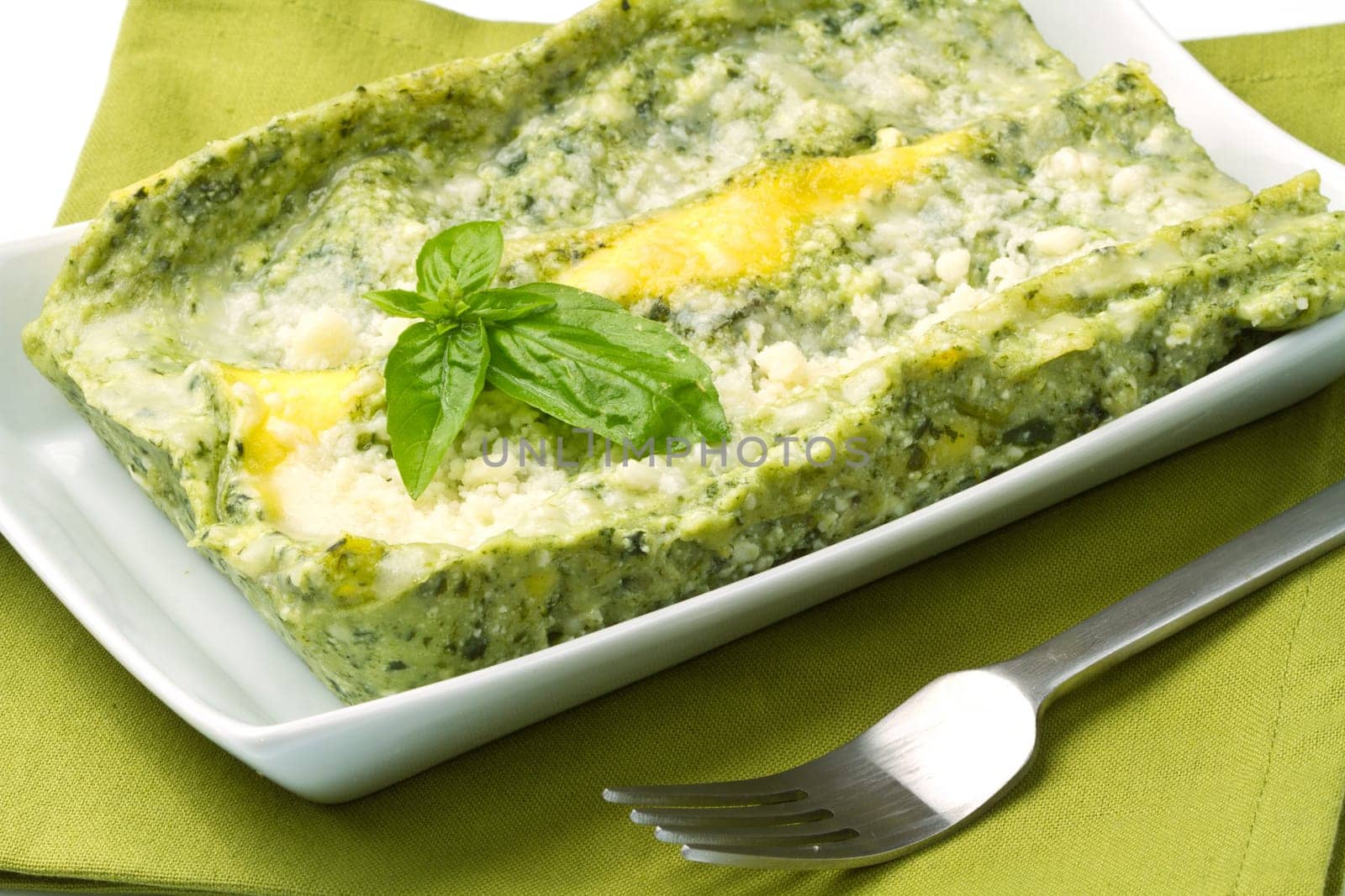 fresh lasagna with pesto sauce
