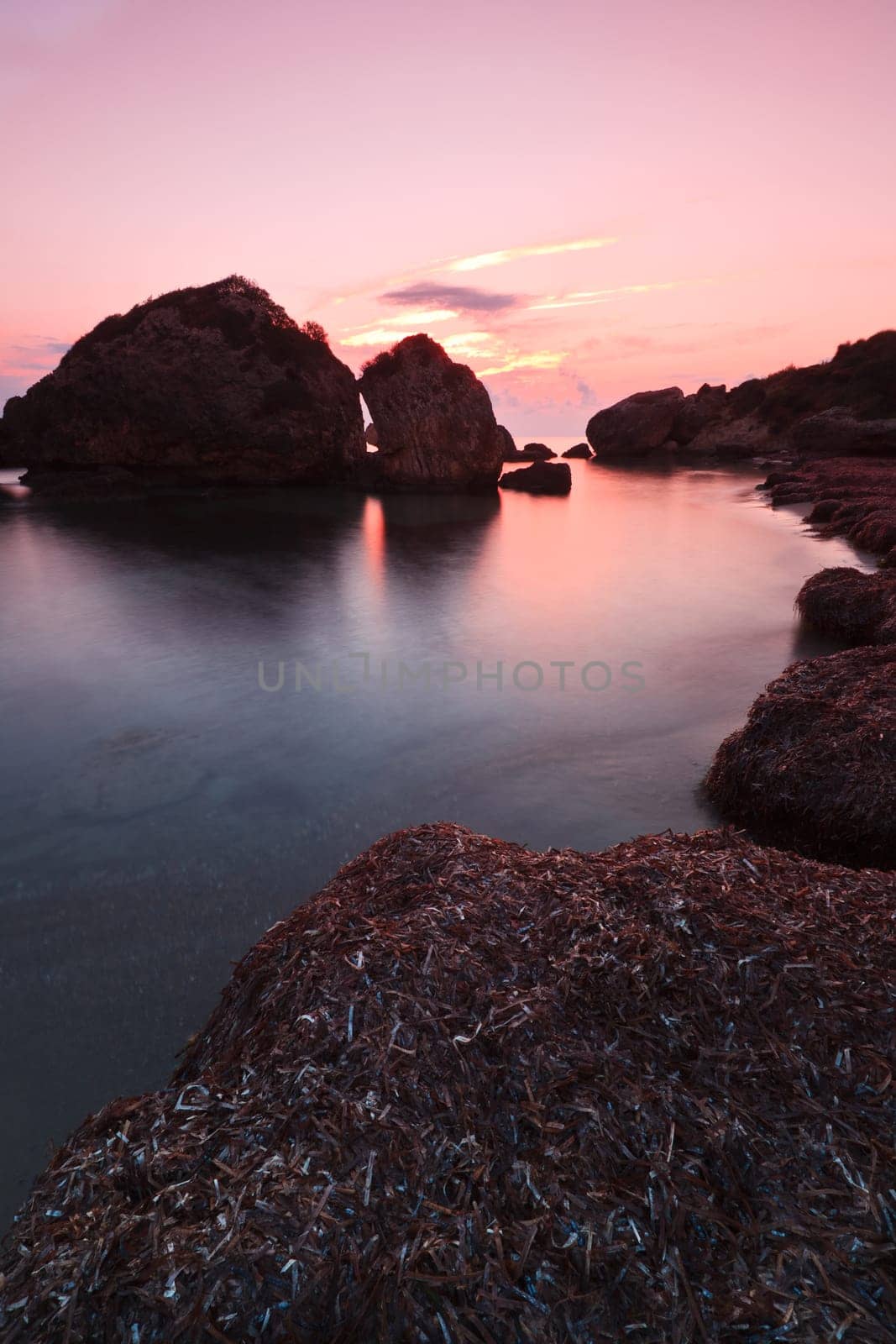 stones in water in a small bay
