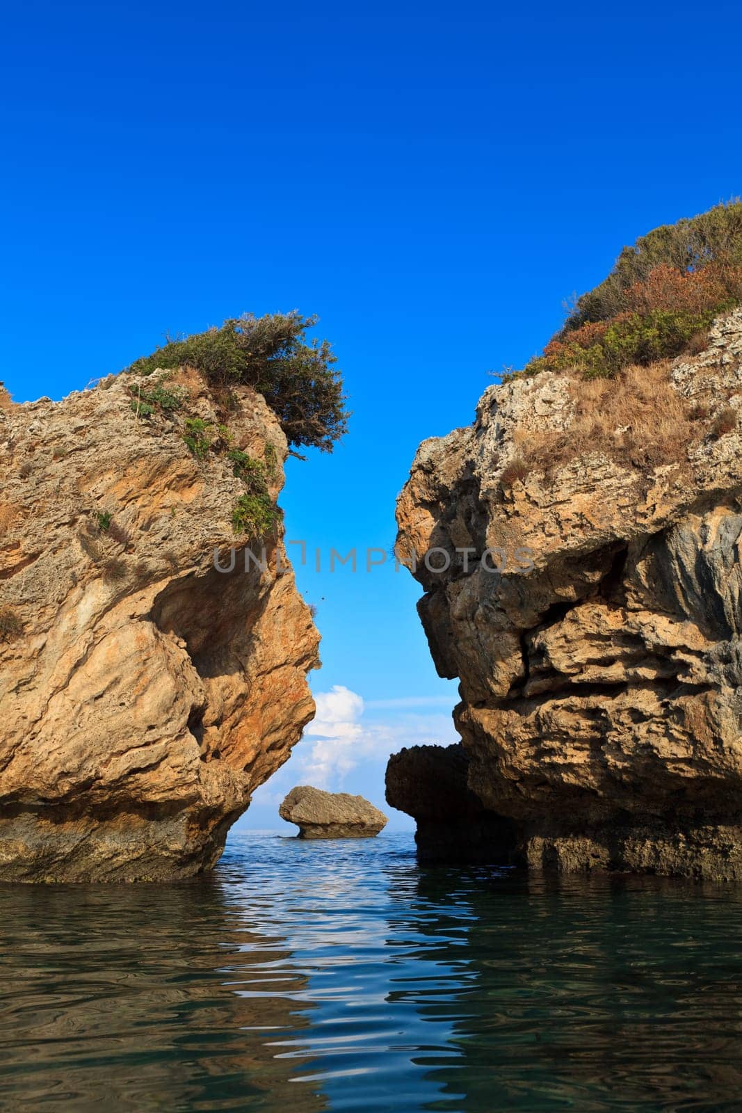a beautiful reflection of stones in the sea