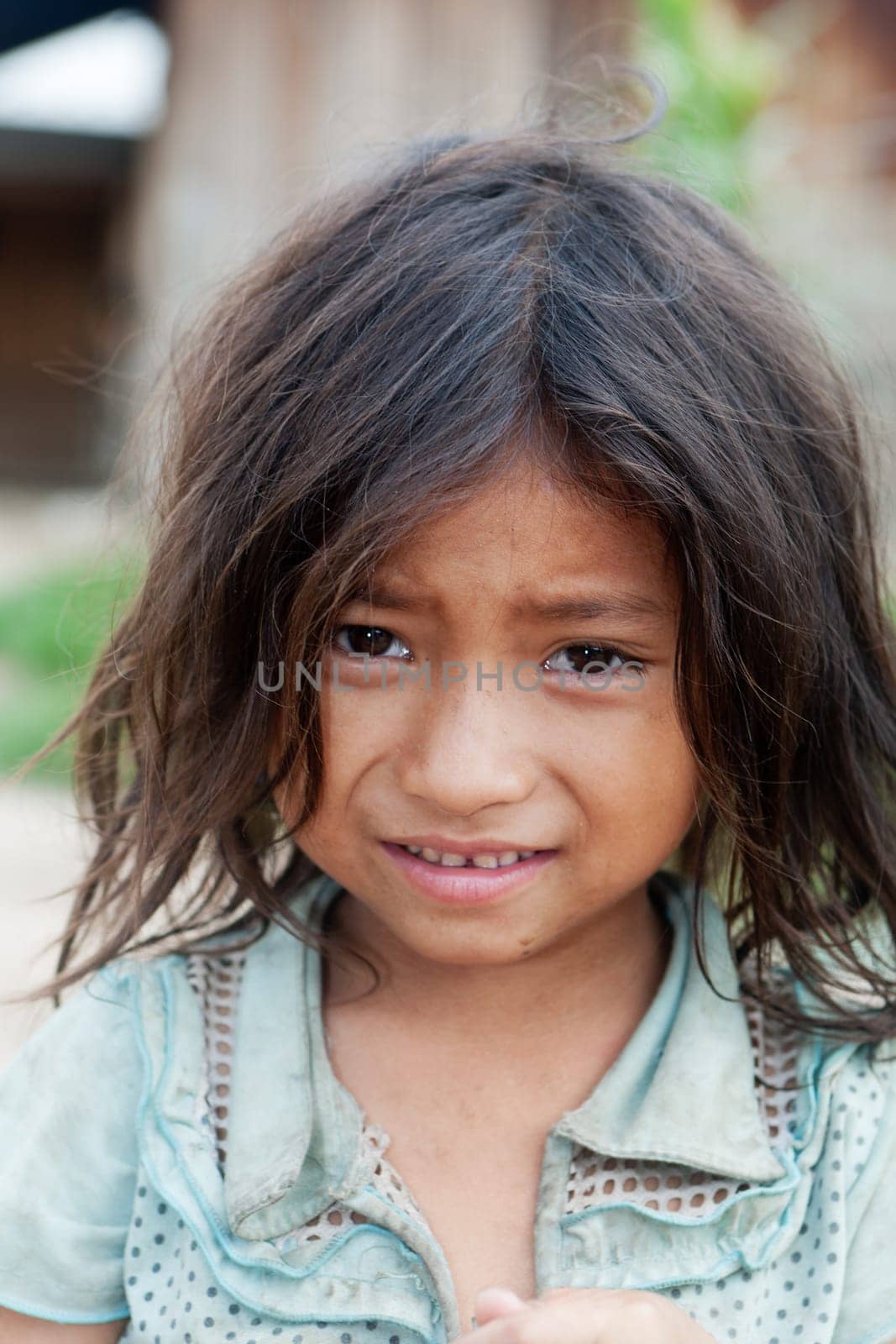 Portrait of asian girl,child with dirty clothes in poverty