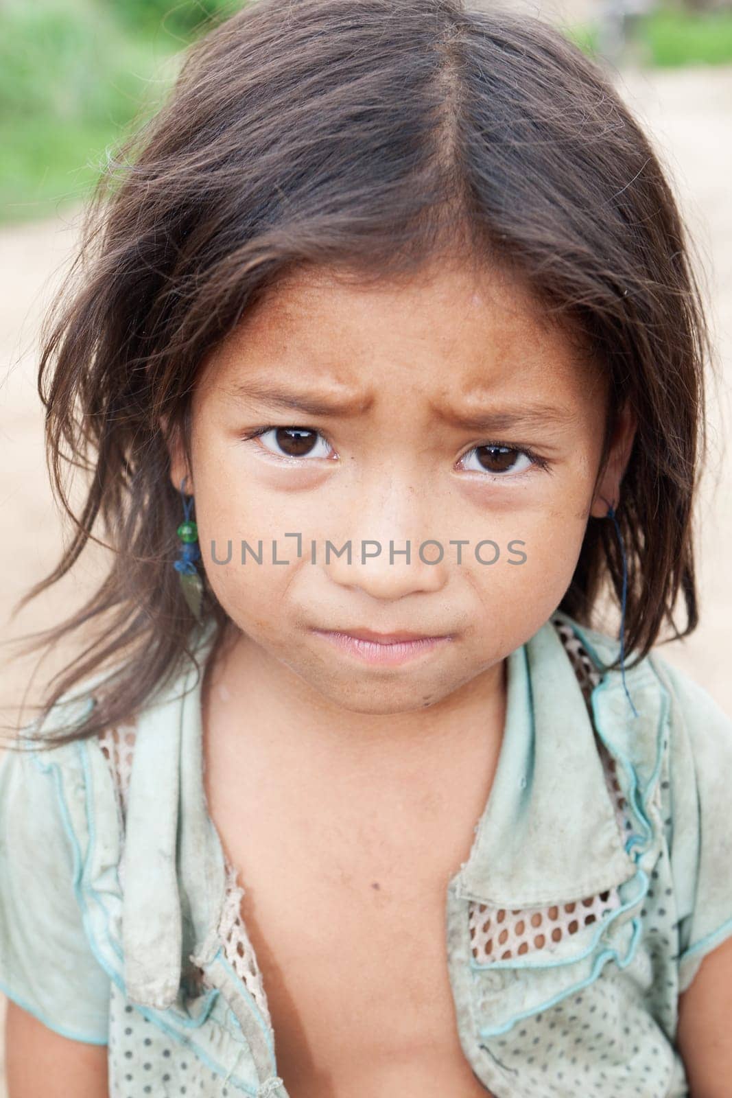 Portrait of asian girl,child with dirty clothes in poverty
