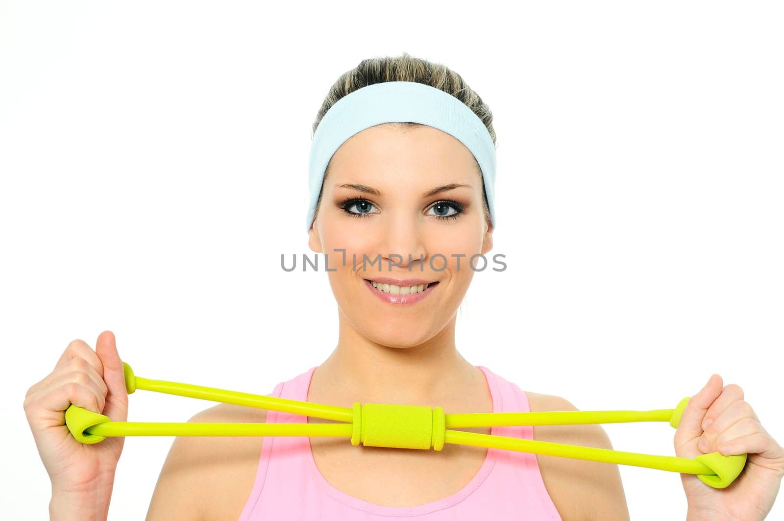 athletic woman doing gymnastic exercises with an elastic fitness