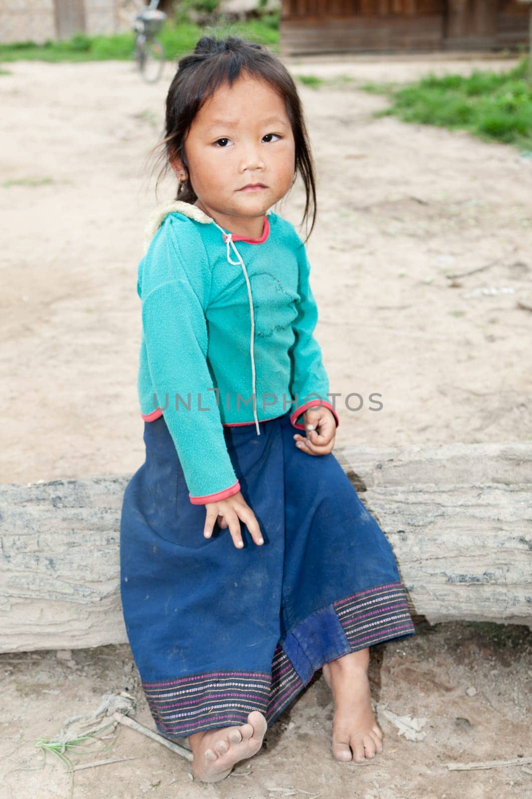Portrait of asian girl,child with old clothes and dirty face