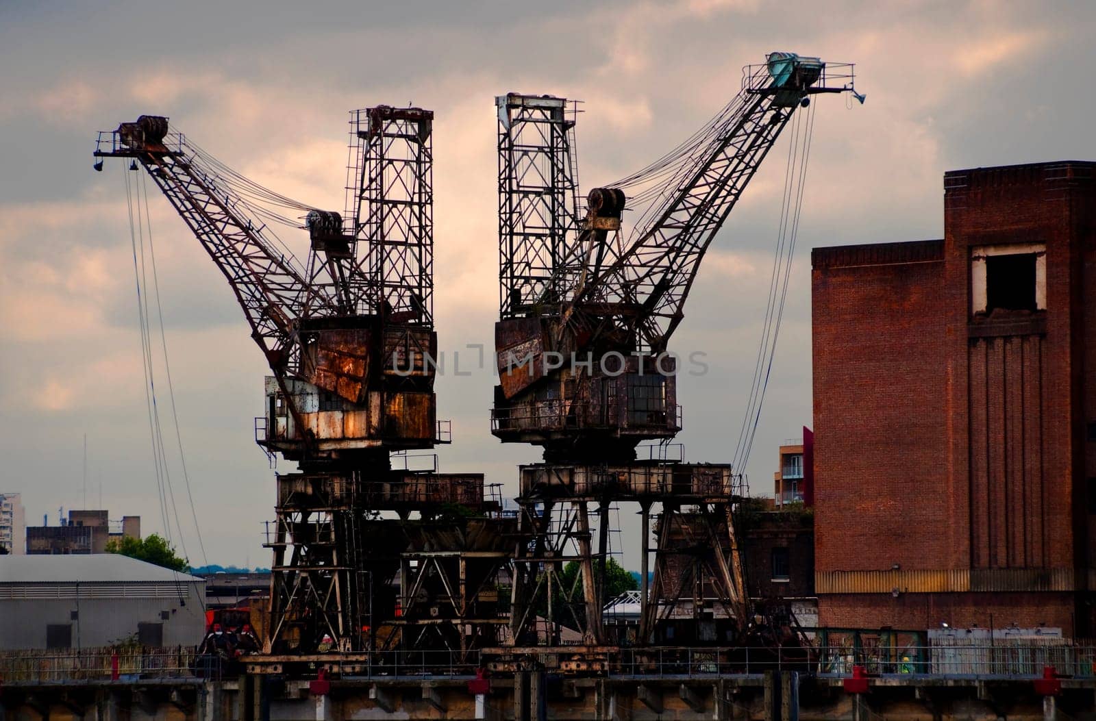 Two rusty cranes at Battersea power station, London, UK