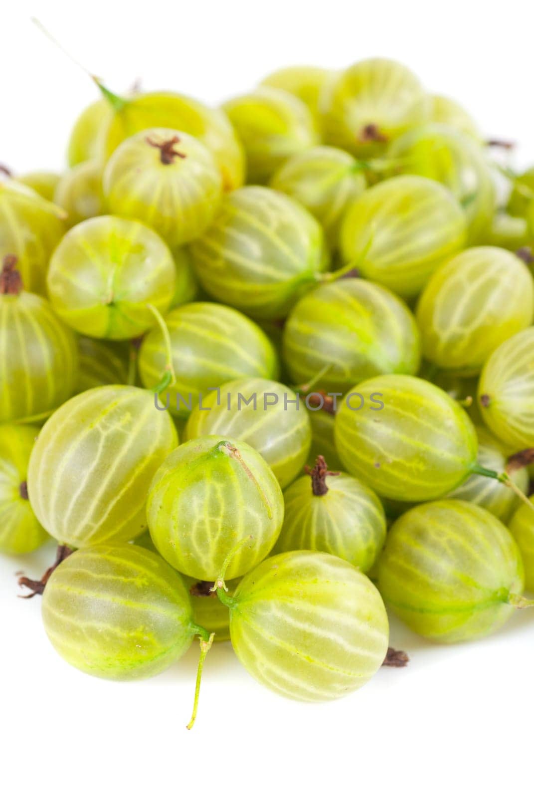 green ripe gooseberries isolated on a white background