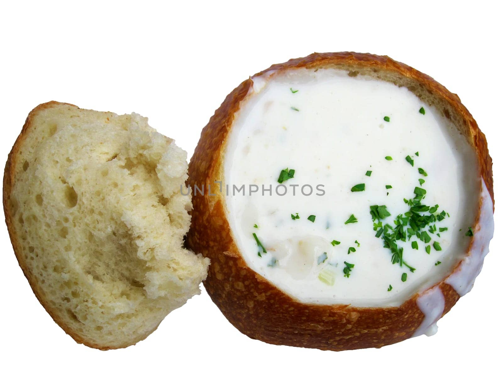 Close-up of a crab soup in a bread bowl