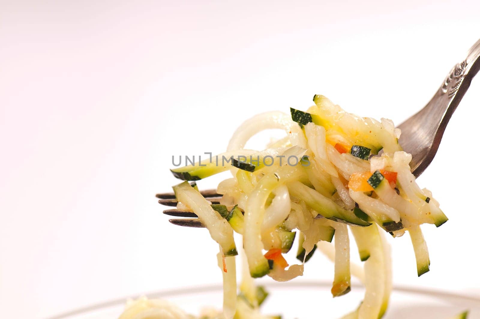Zucchini salad in glass bowl