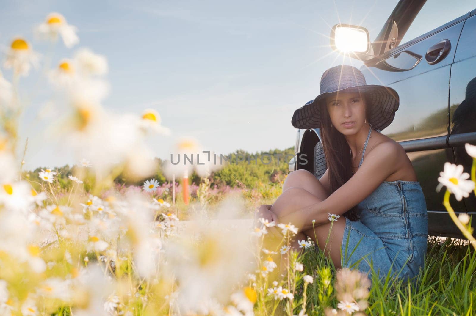 Outdoor shot of beautiful brunette woman with long hair