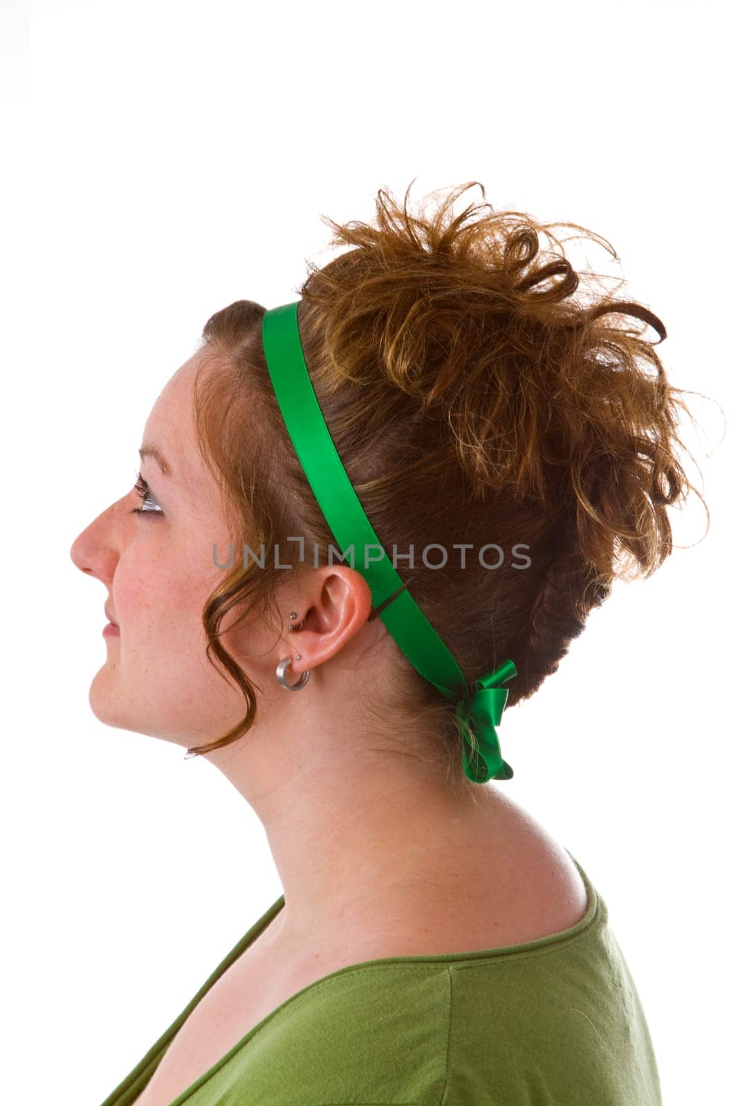 Young woman with high hairstyle isolated on white background