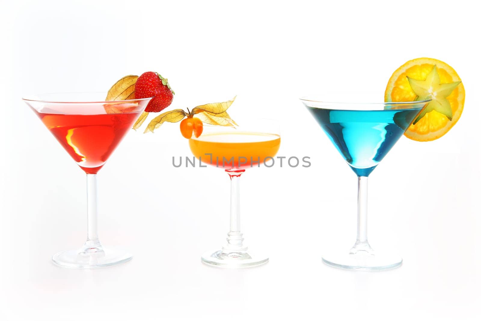 Different cocktails or longdrinks garnished with fruits