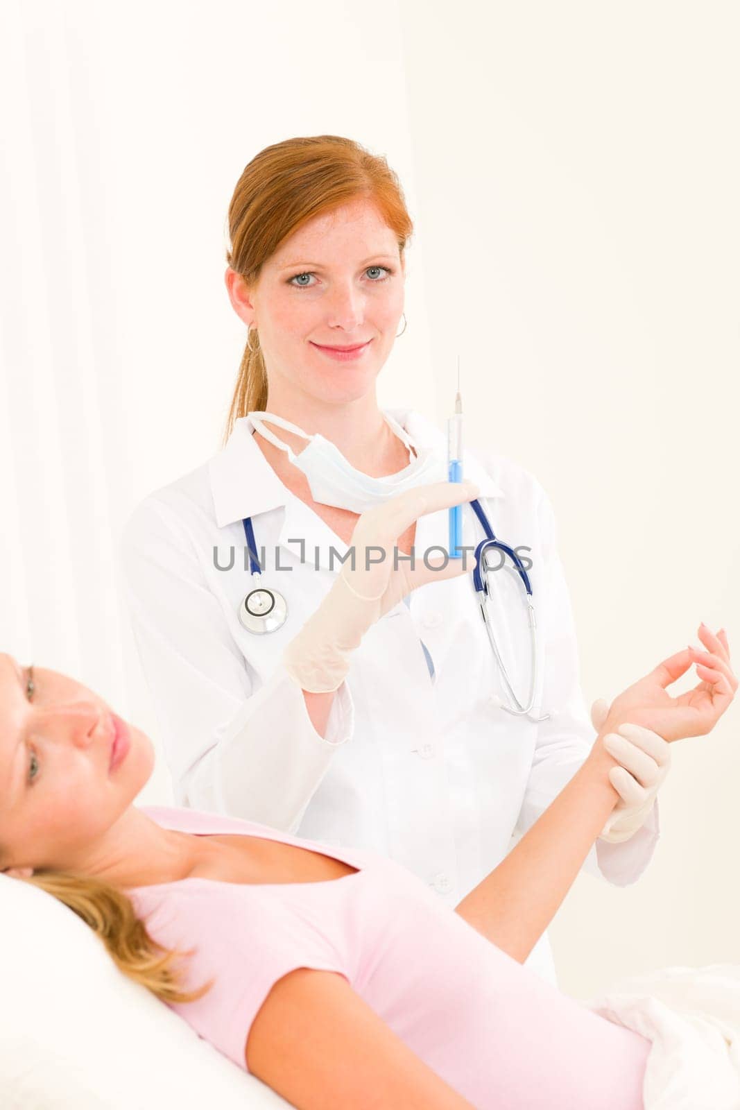 Female medical doctor apply injection woman patient