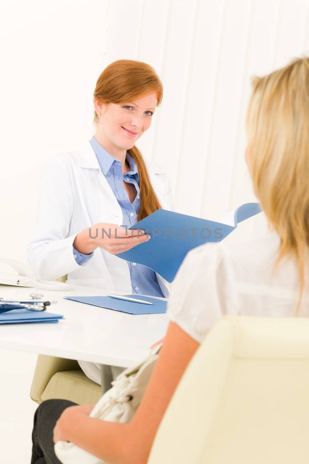 Female medical doctor consultation woman patient sitting in office