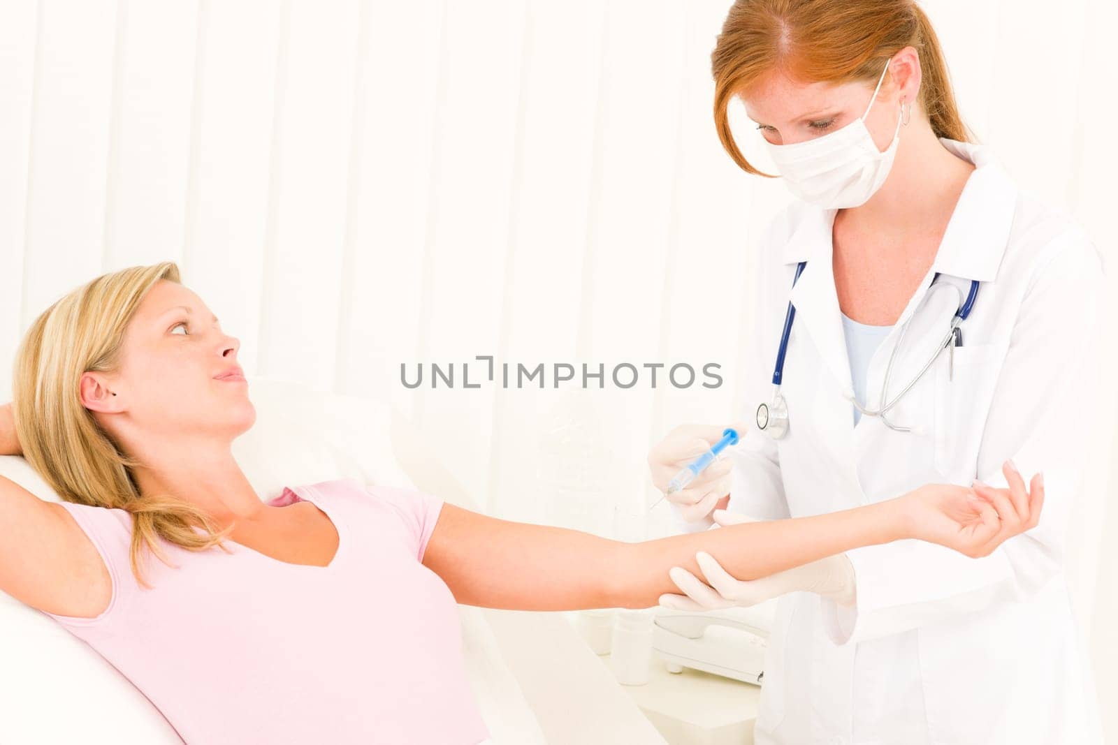 Female medical doctor apply injection woman patient