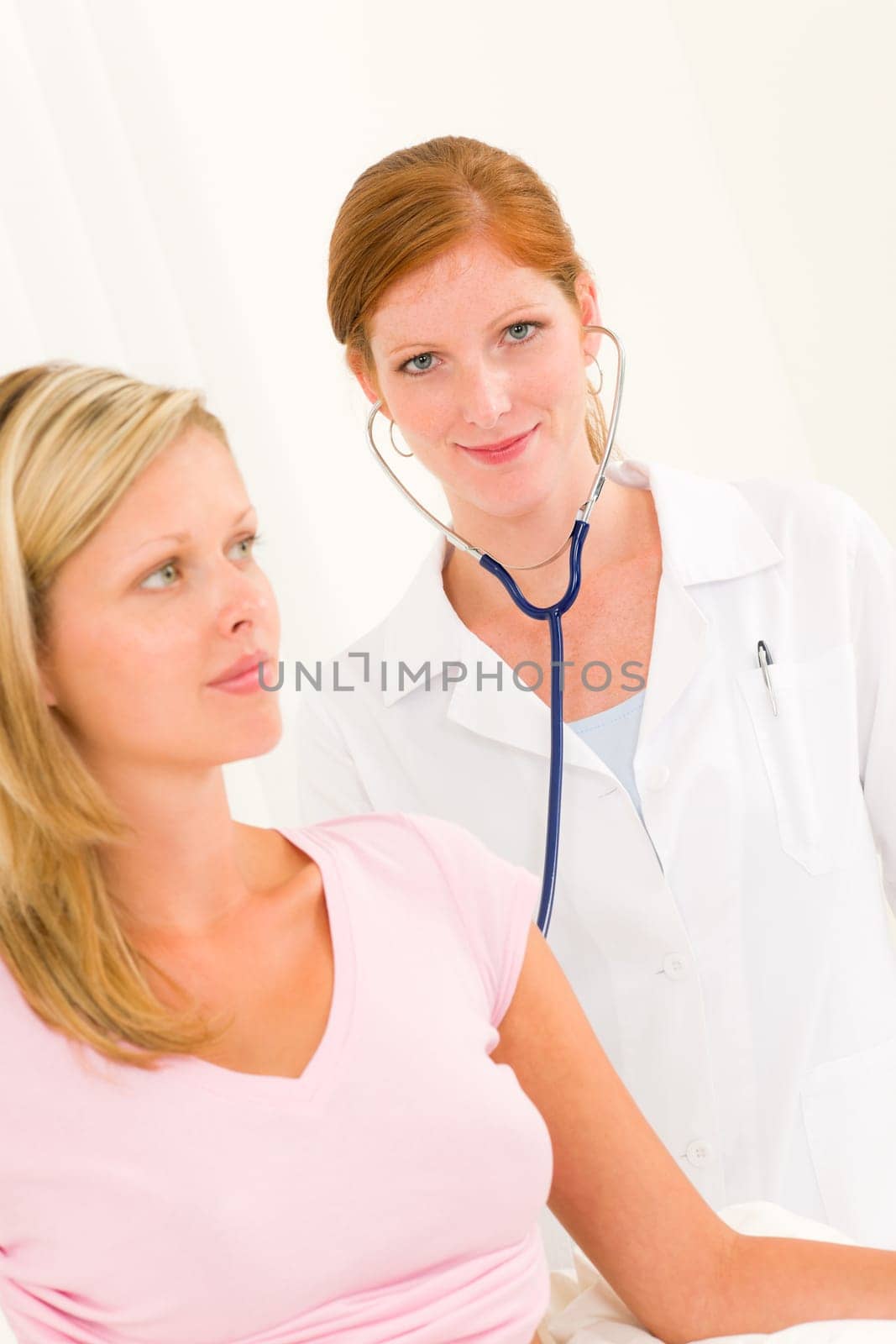 Medical professional female doctor with stethoscope examine woman patient