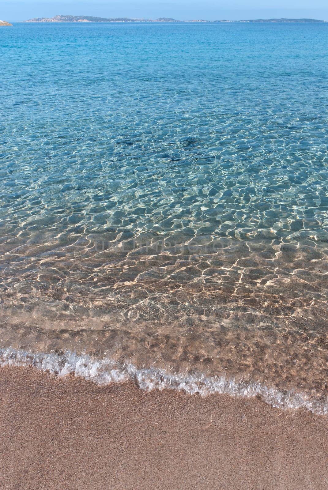 clear sea on the beach on the island of La Maddalena Lower Trinity