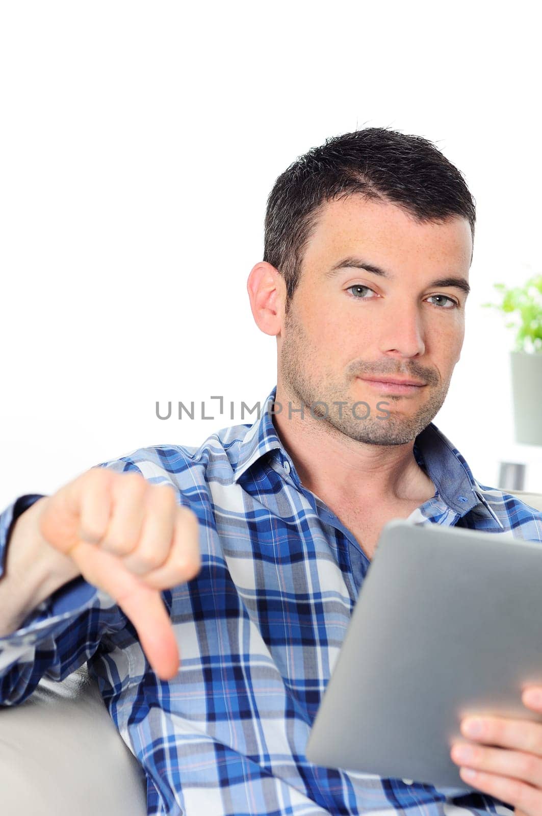 attractive relaxed and negative man is surfing on his