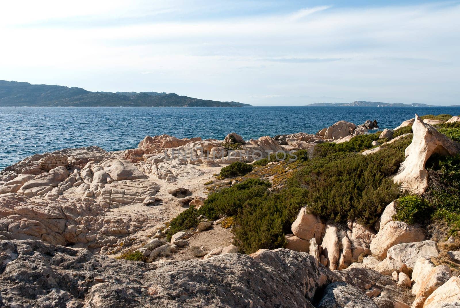 Pink granite rocks on the sea on La Maddalena in Sardinia
