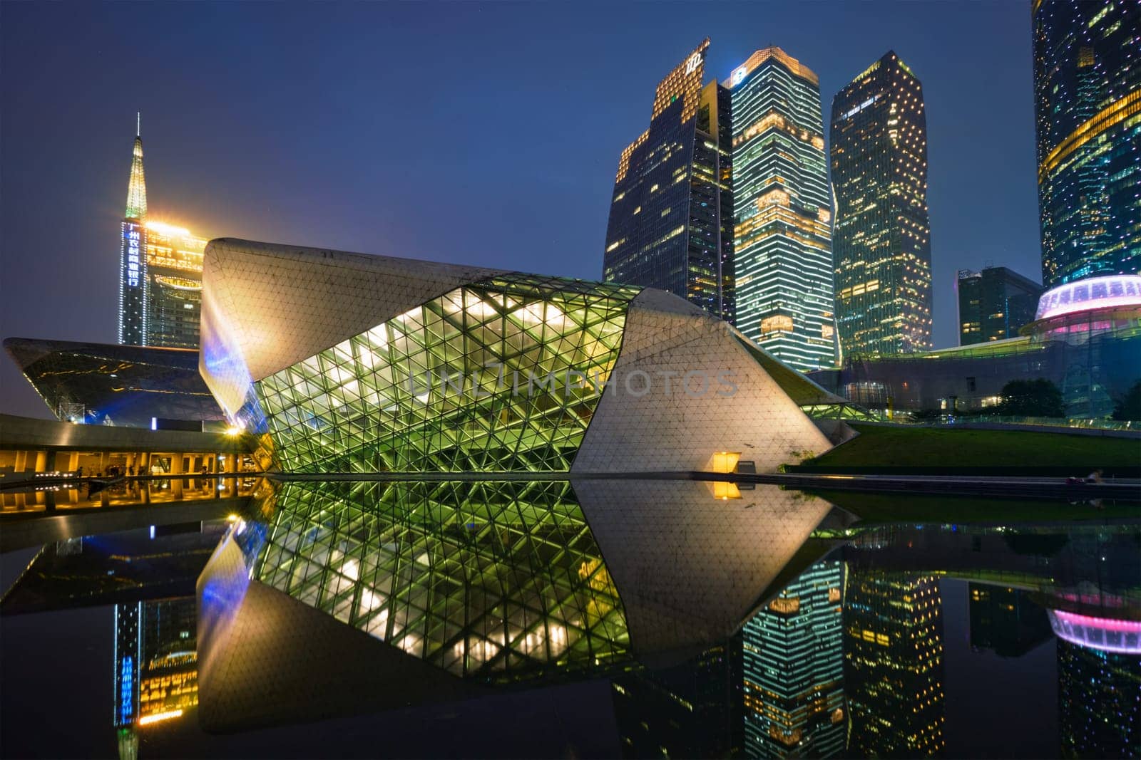 GUANGZHOU, CHINA - APRIL 27, 2018: Guangzhou Opera House designed by famous Iraqi architect architect Zaha Hadid illluminated at night