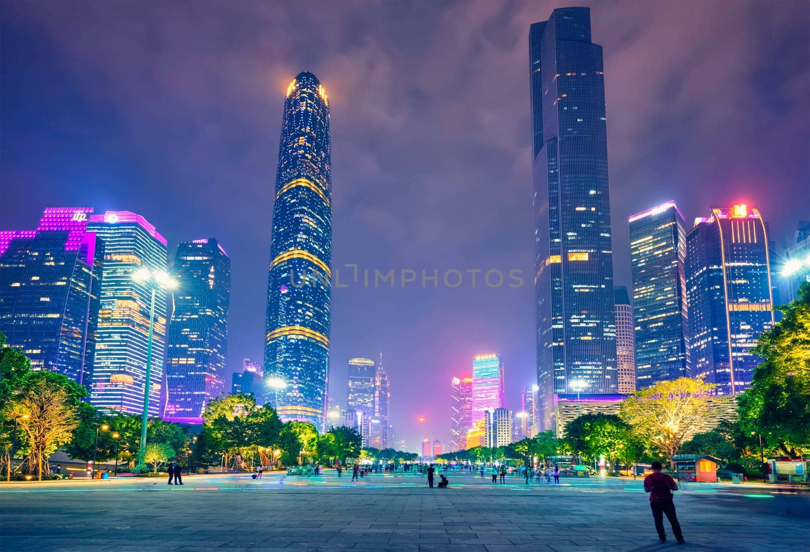 GUANGZHOU, CHINA - APRIL 27, 2018: Guangzhou cityscape skyline over the Pearl River illuminated in the evening. Guangzhou, China