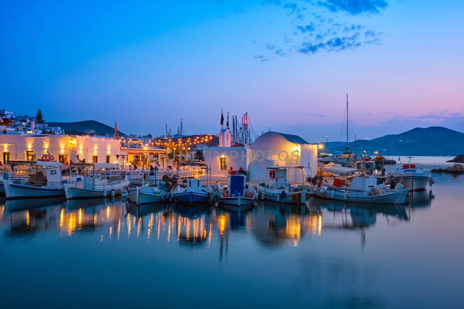 Picturesque Naousa town on Paros island, Greece in the night by dimol