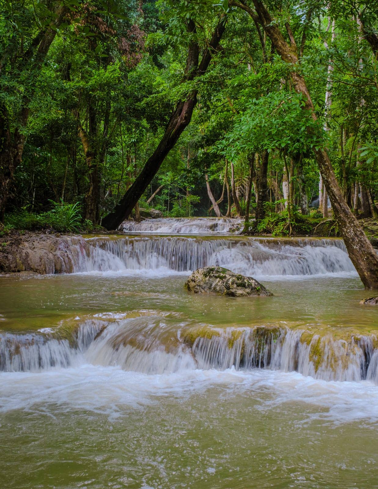 a beautiful deep forest waterfall in Thailand. Erawan Waterfall in National Park