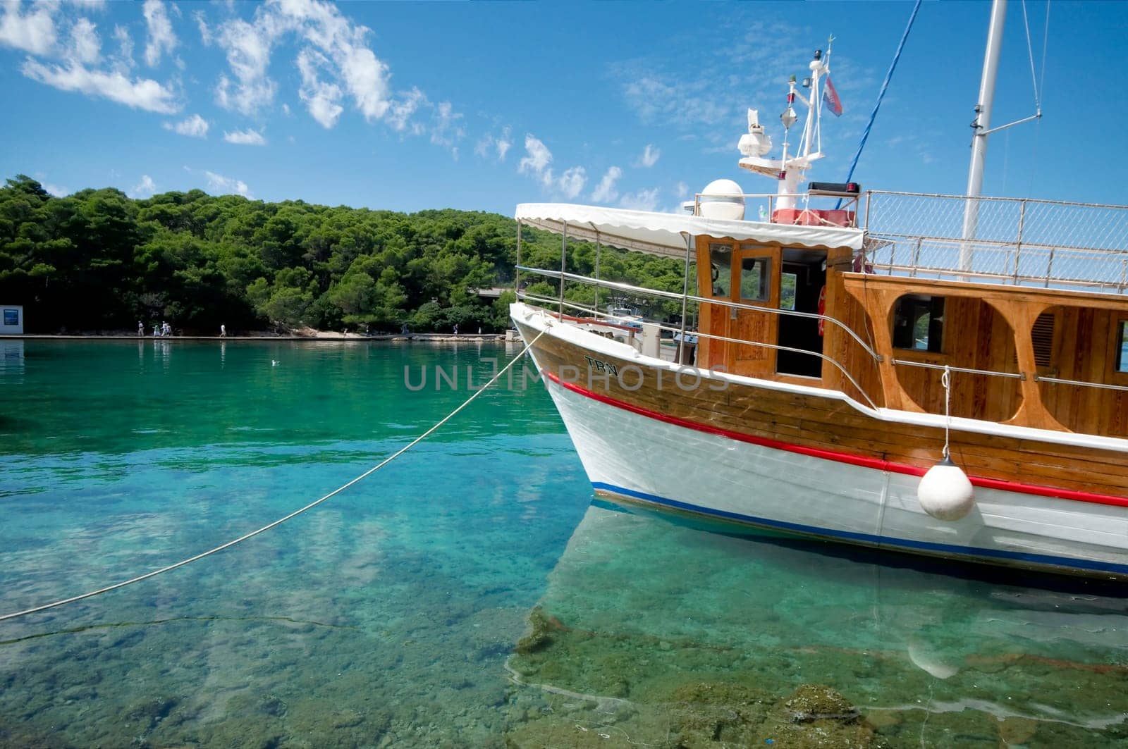 Anchored ship in clear waters of the Mediterranean Sea