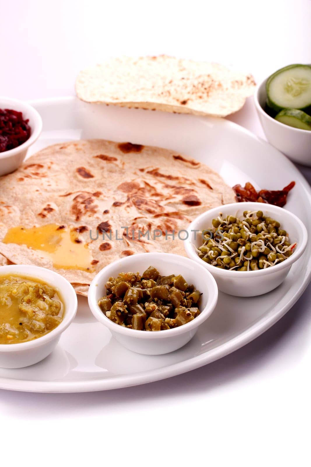 Indian lunch - chapatti, vegetables, sprouts and curries