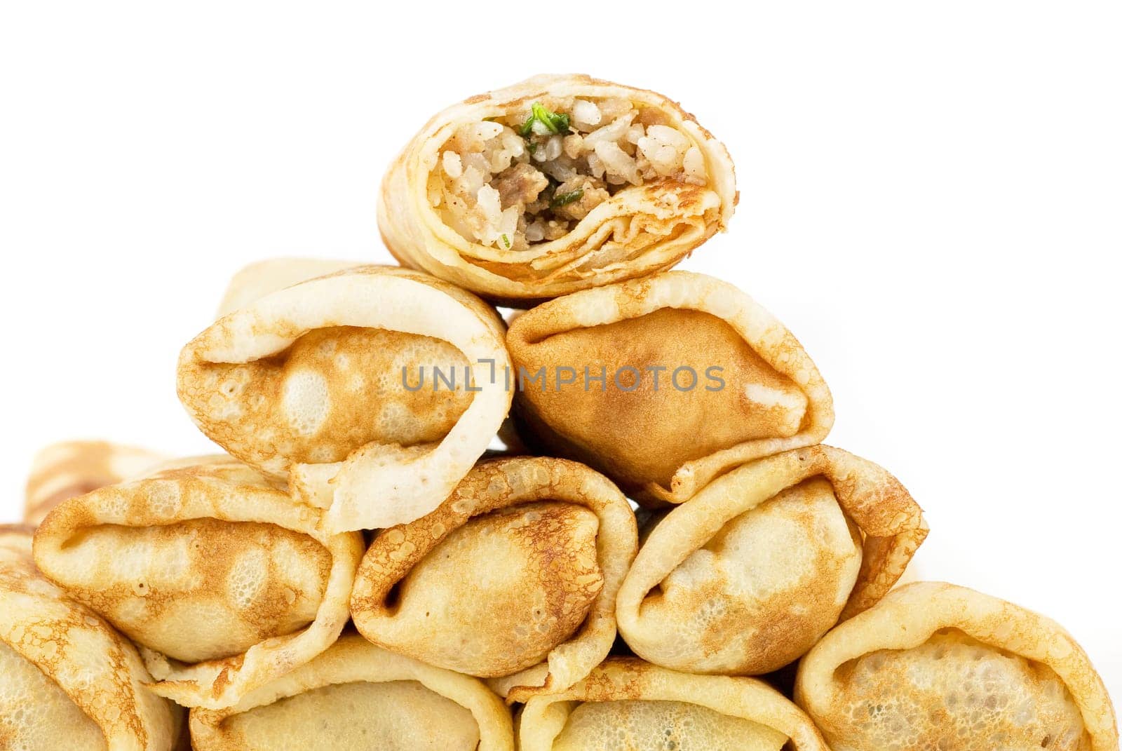 a pancakes with meat and rice closeup
