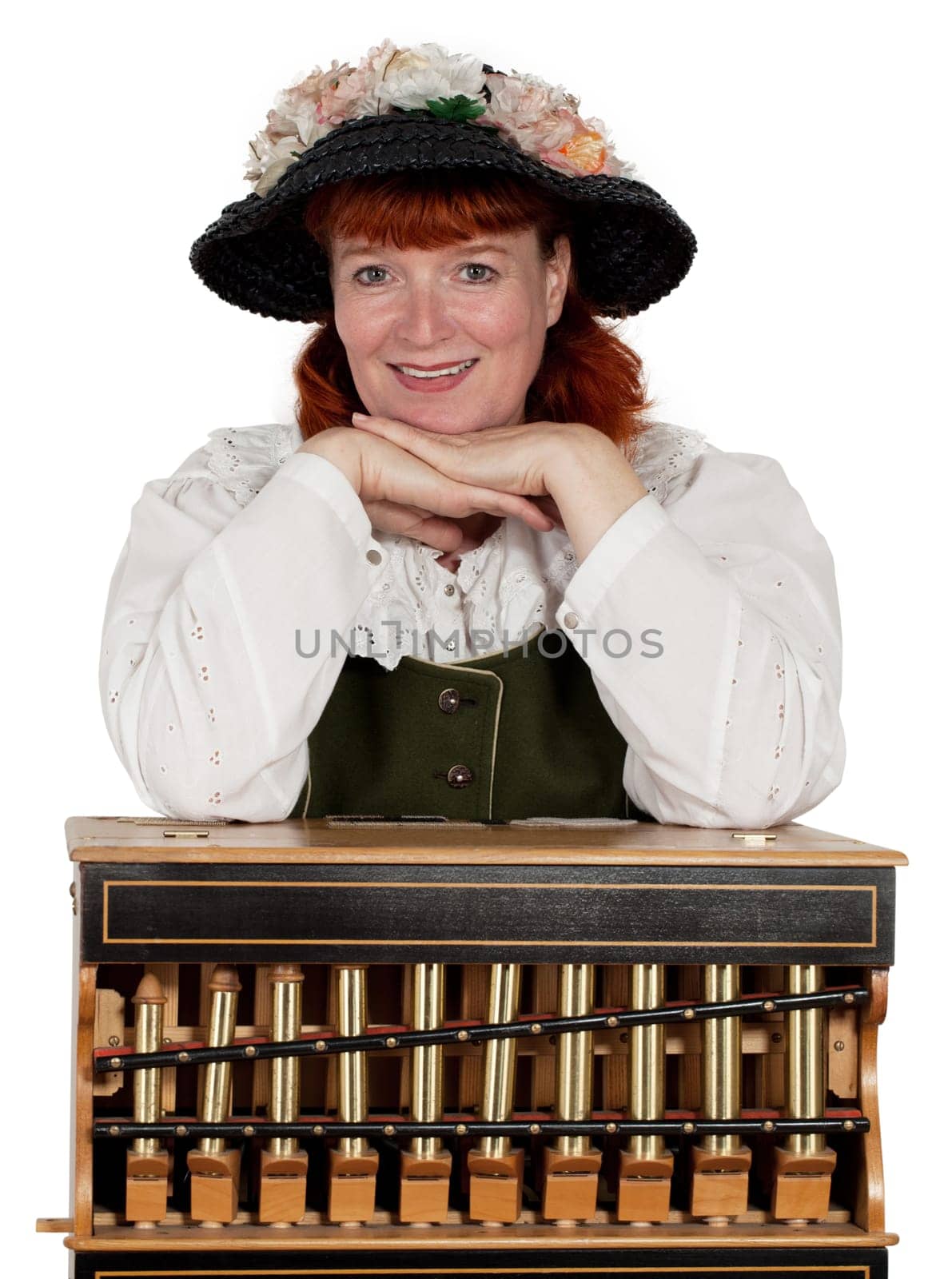 A woman barrel organ player isolated on white