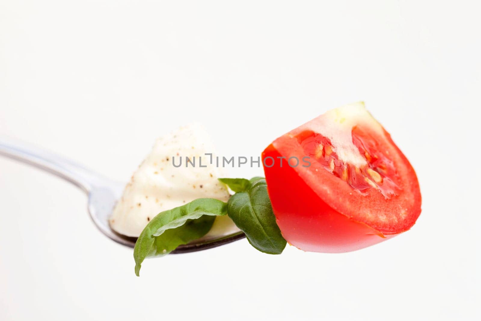 Fork with tomato mozzarella
