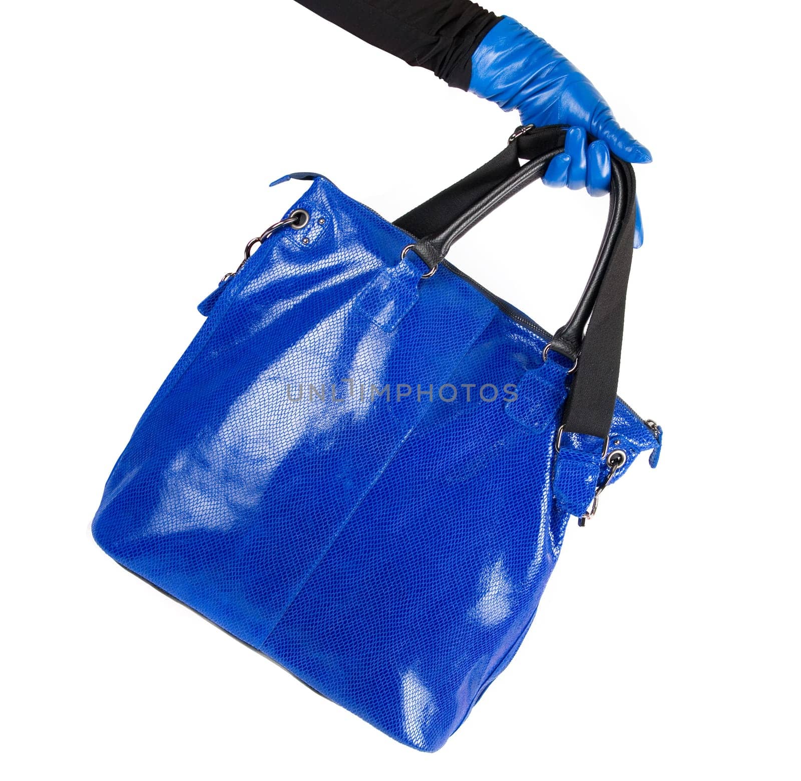 blue women bag at hand isolated on white background