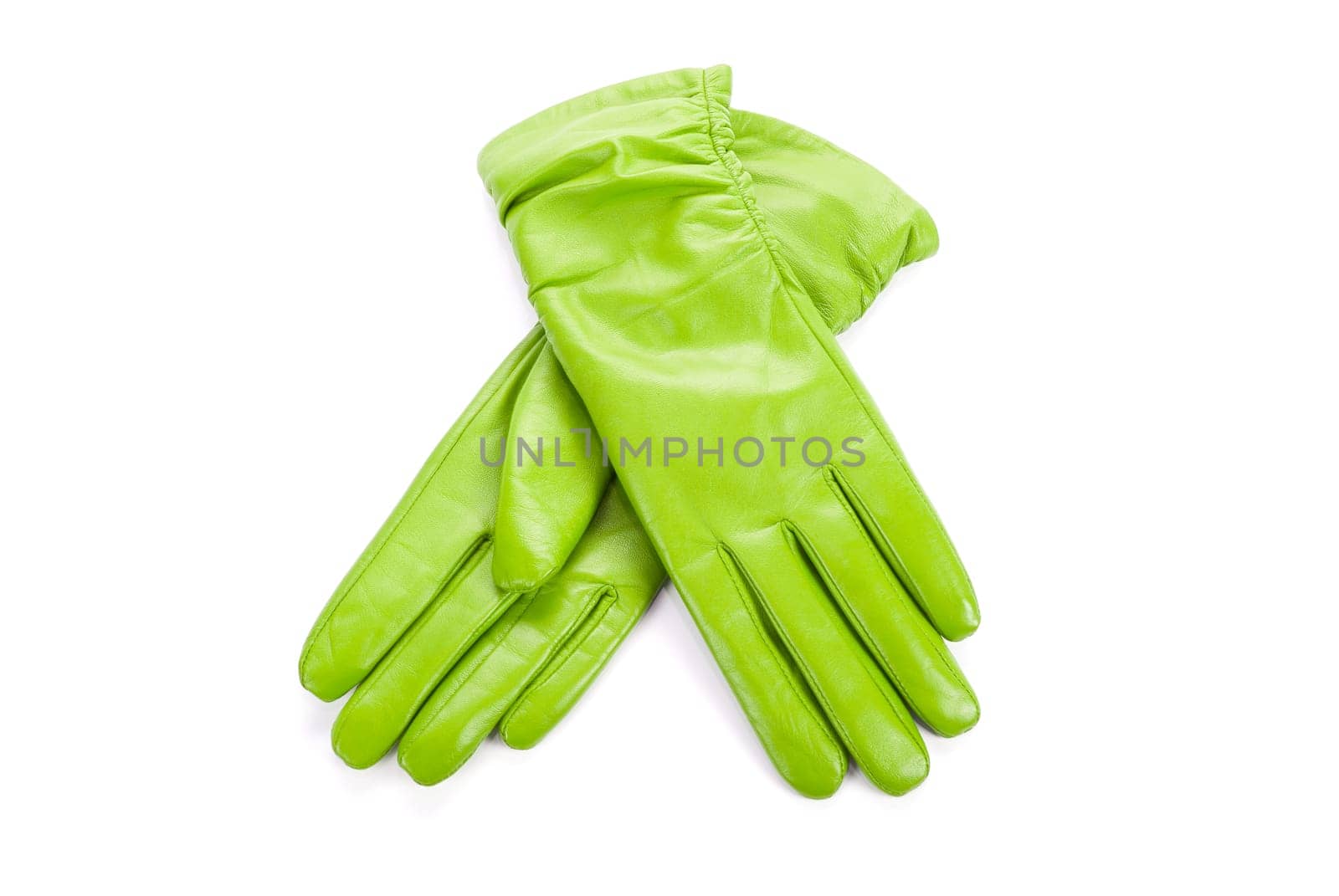 Green modern female leather gloves isolated on a white