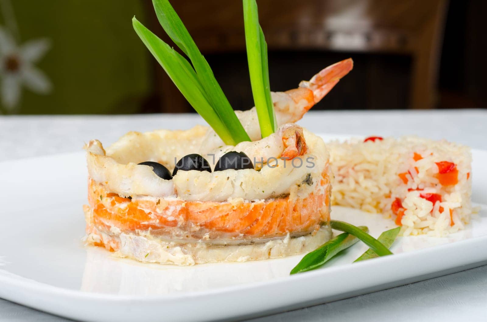 tasty prepared fish with rice and vegetables