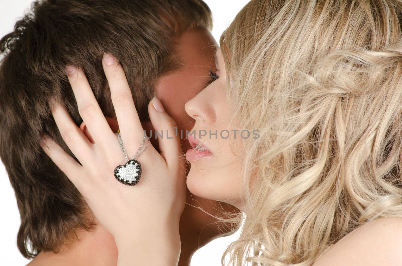 Beauty man and woman - lovers closeup portraits