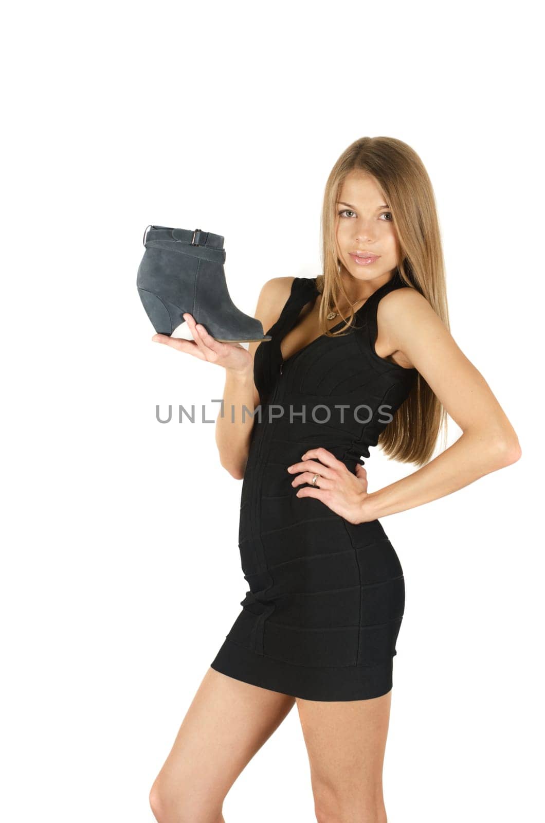 beautiful young woman with a shoe on white