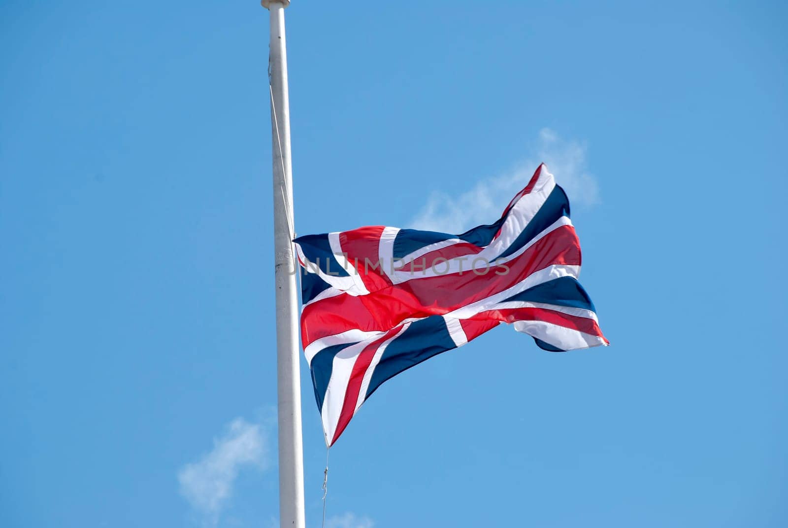 A British Union Jack Flag flying in a breeze