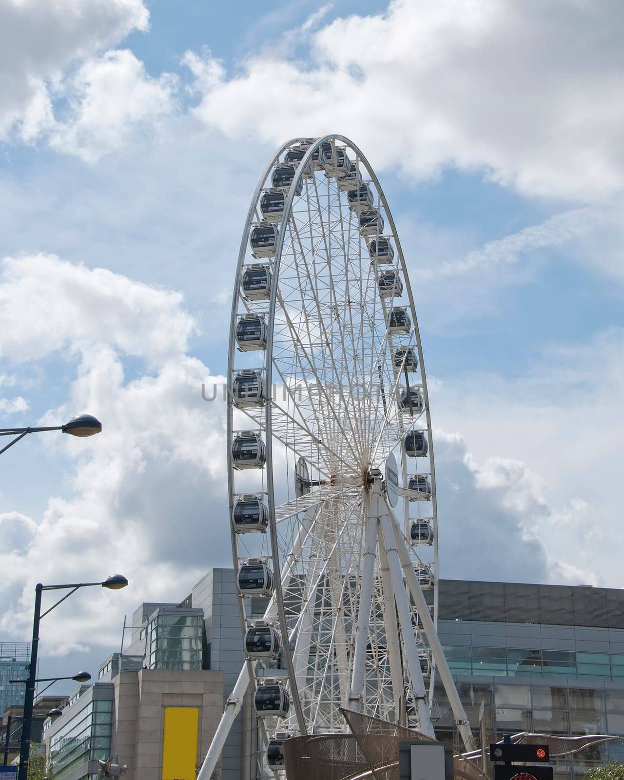 A Fairground Wheel on a city shopping plaza