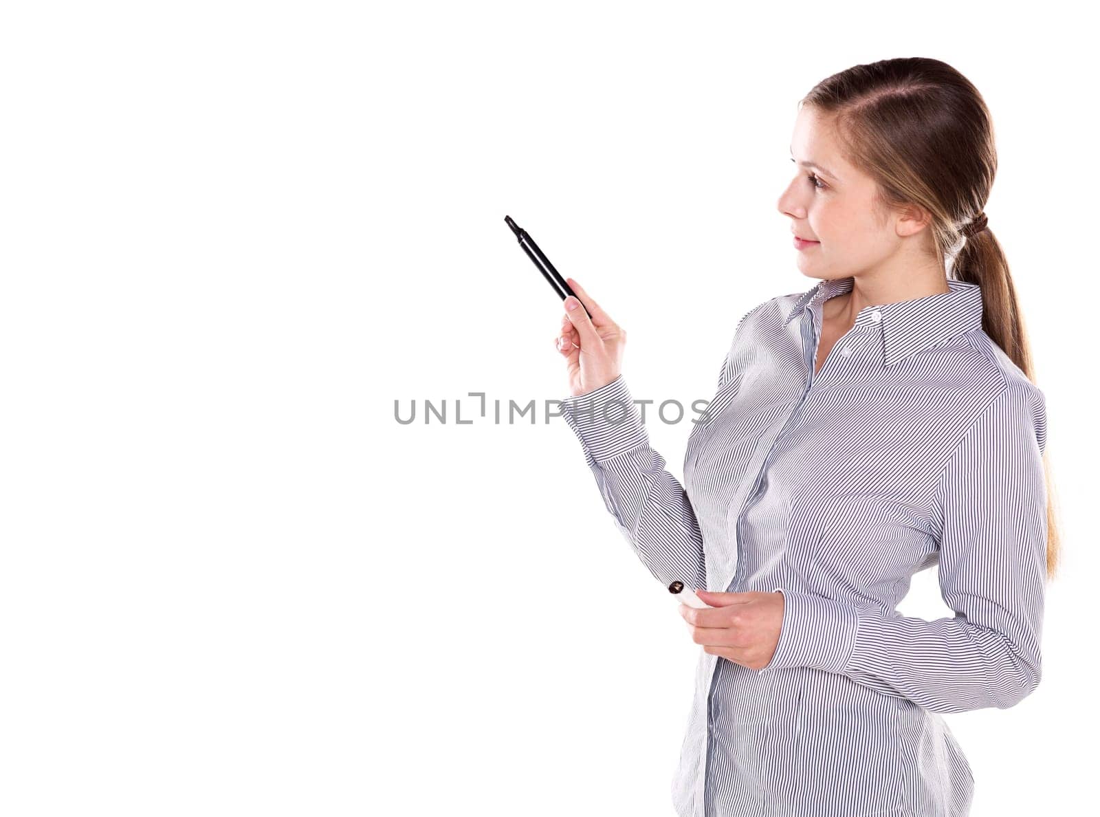 Young woman pointing with pen