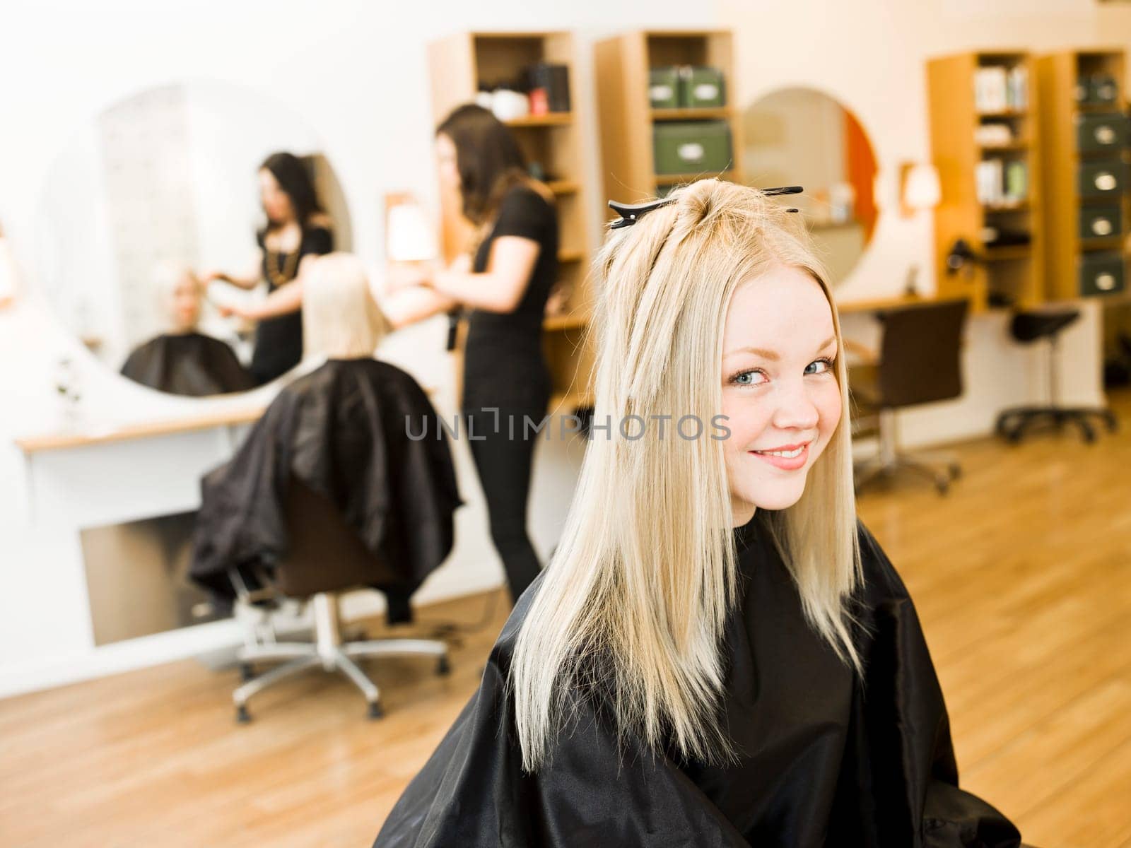 Young Blond Girl in the Hair Salon
