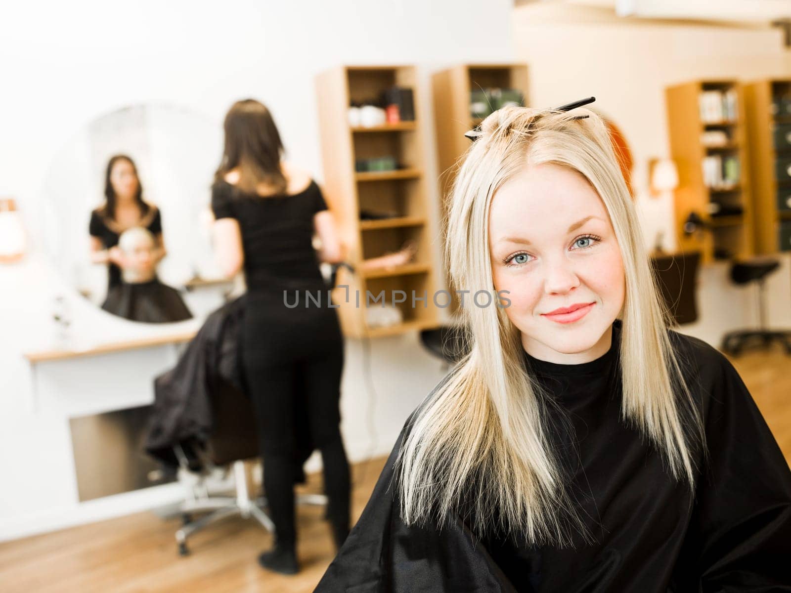 Young Blond Girl in the Hair Salon