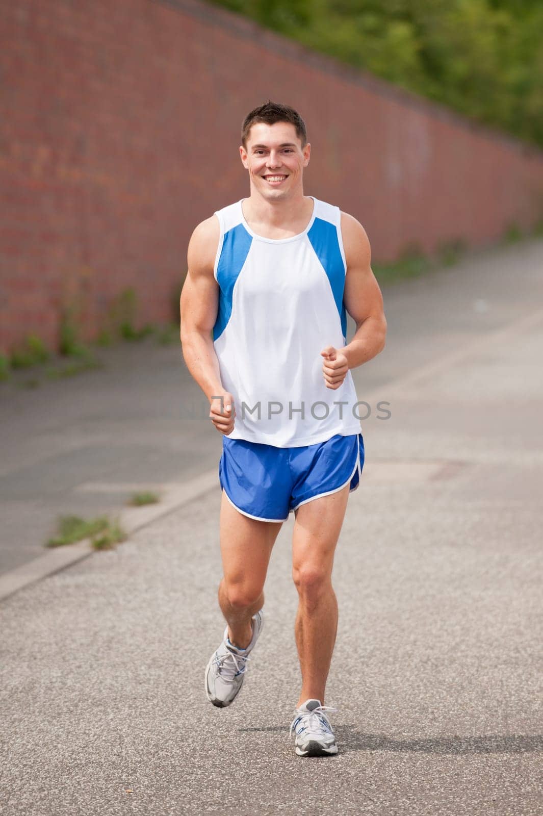 Young man doing running training