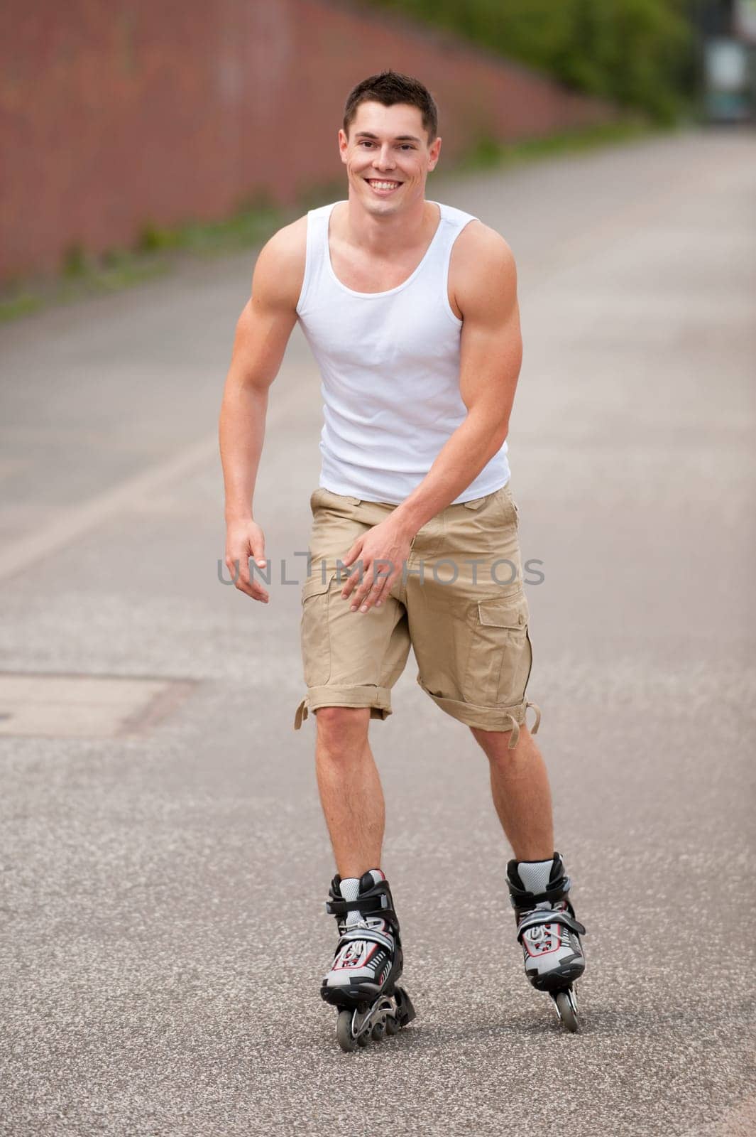 Young man with inline skater