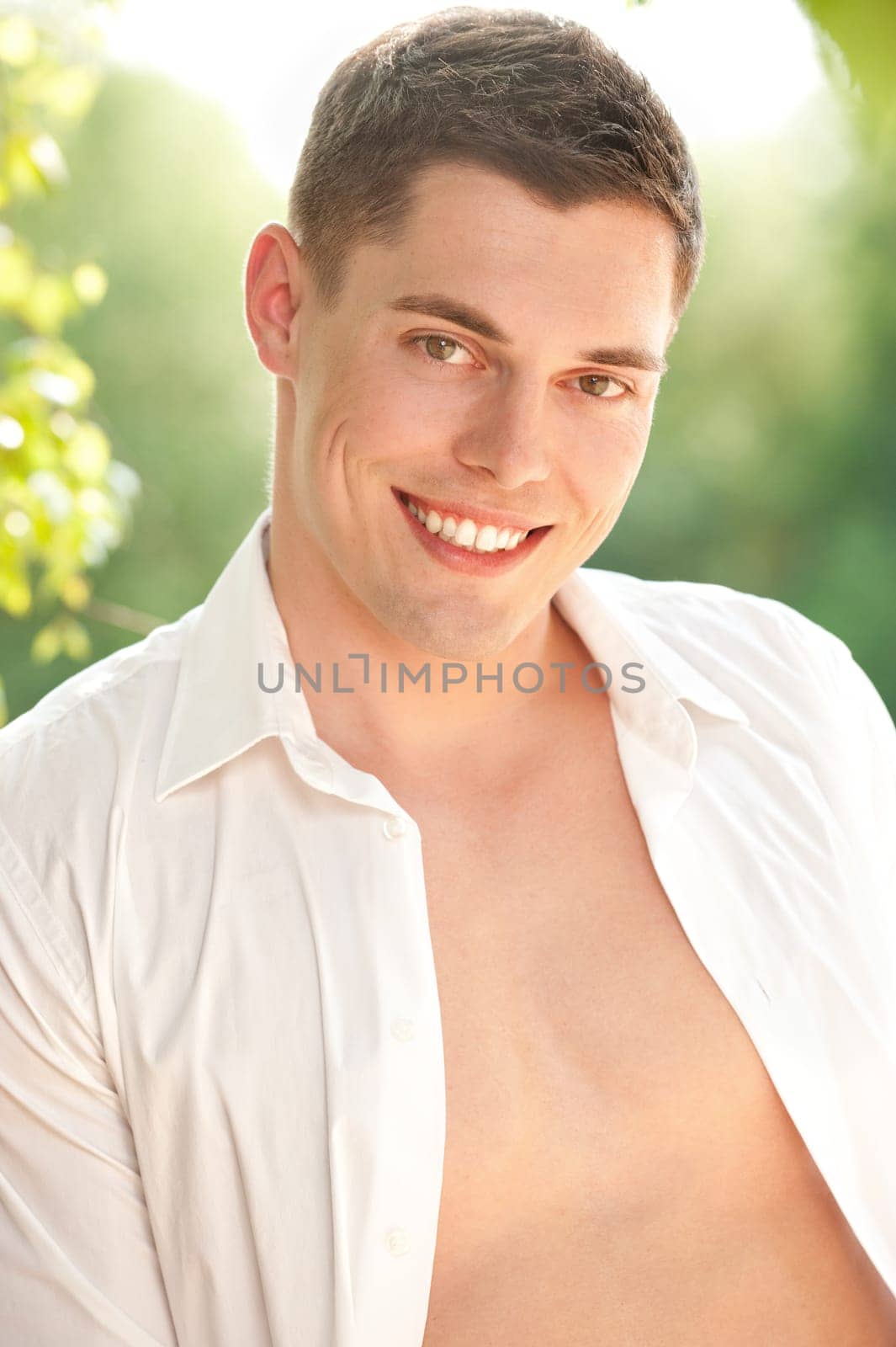 Fashion shot of a young and happy man