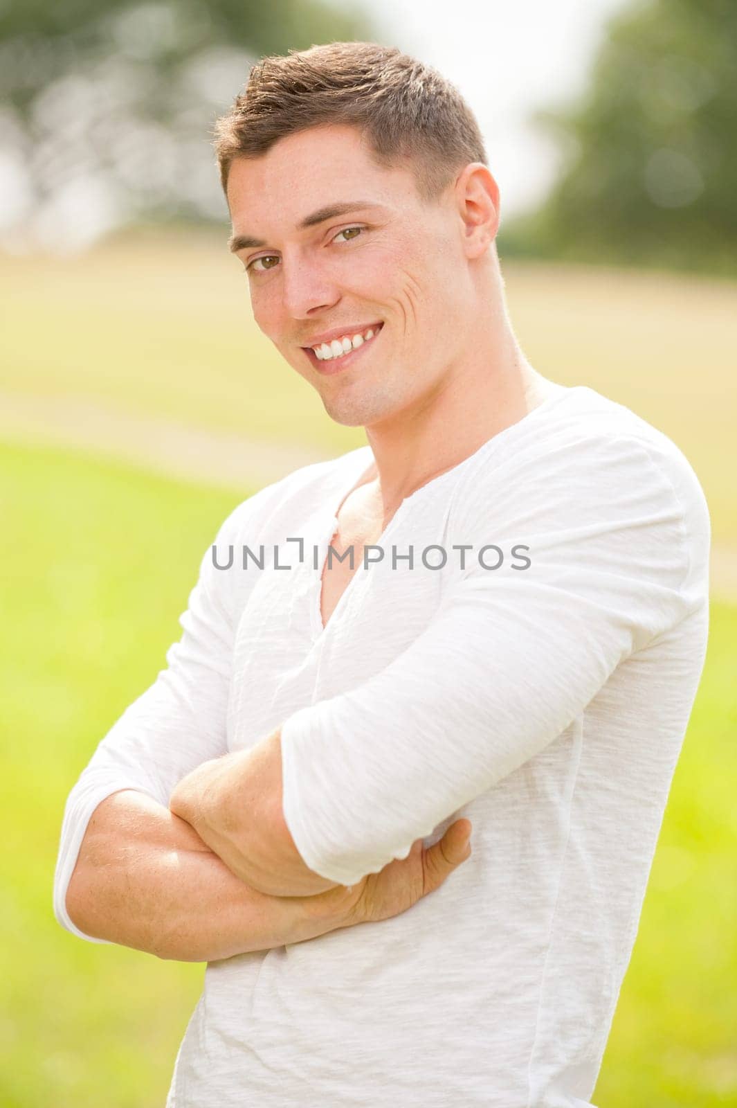 Portrait of a young and smiling man