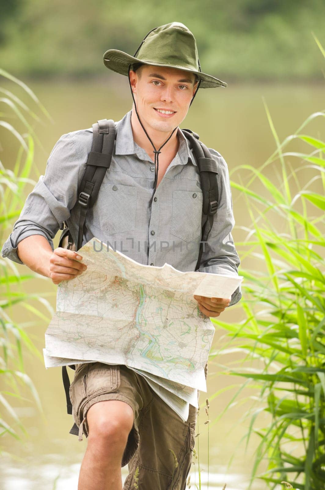 Young hiker at a lake
