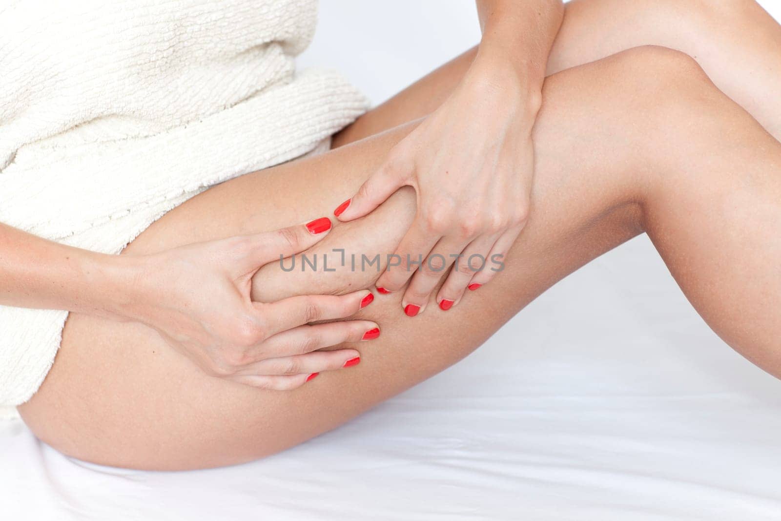 Woman doing a cellulite test